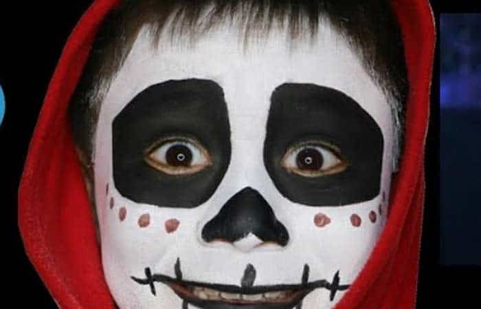 Pintarle la cara a los niños en Carnaval, Miguel (Coco)