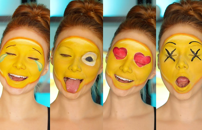 Mujer con cuadro maquillajes de caritas para el Día del emoji